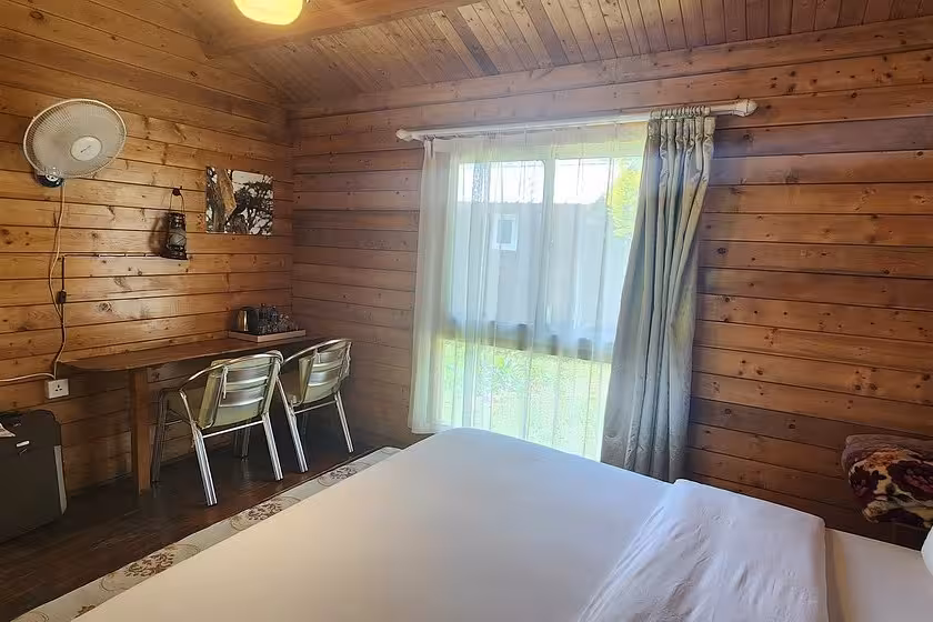 Jambo Mara Safari Wood Cabin Bedroom